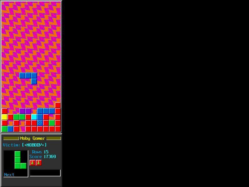 Varmint's Eittris (DOS) screenshot: In a single player game there's no advantage in collecting special blocks. Most of the screen is blank/black as it's used for the falliing bricks of the other players.
