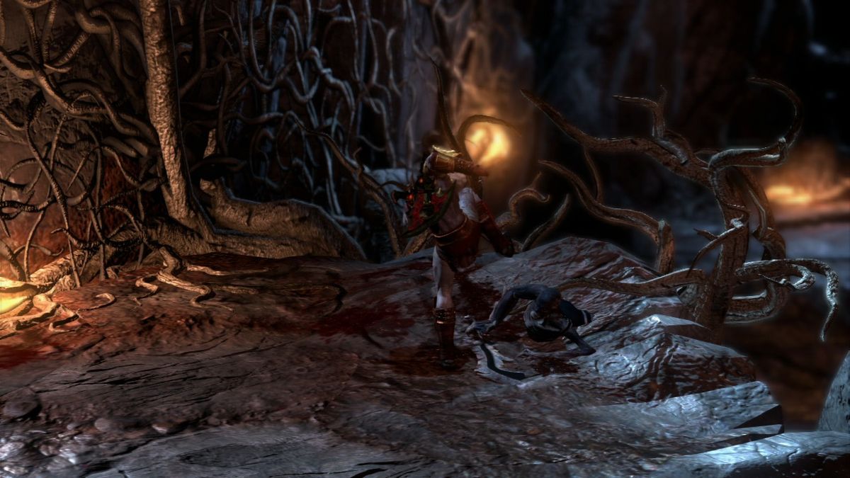 God of War III (PlayStation 3) screenshot: Some enemies will be persistence, but you can stomp them down.