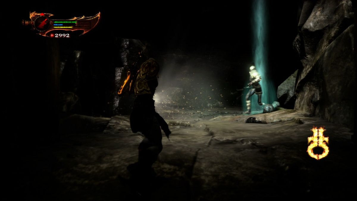 God of War III (PlayStation 3) screenshot: With the head of Helios you can see in dark and also stun the enemy.