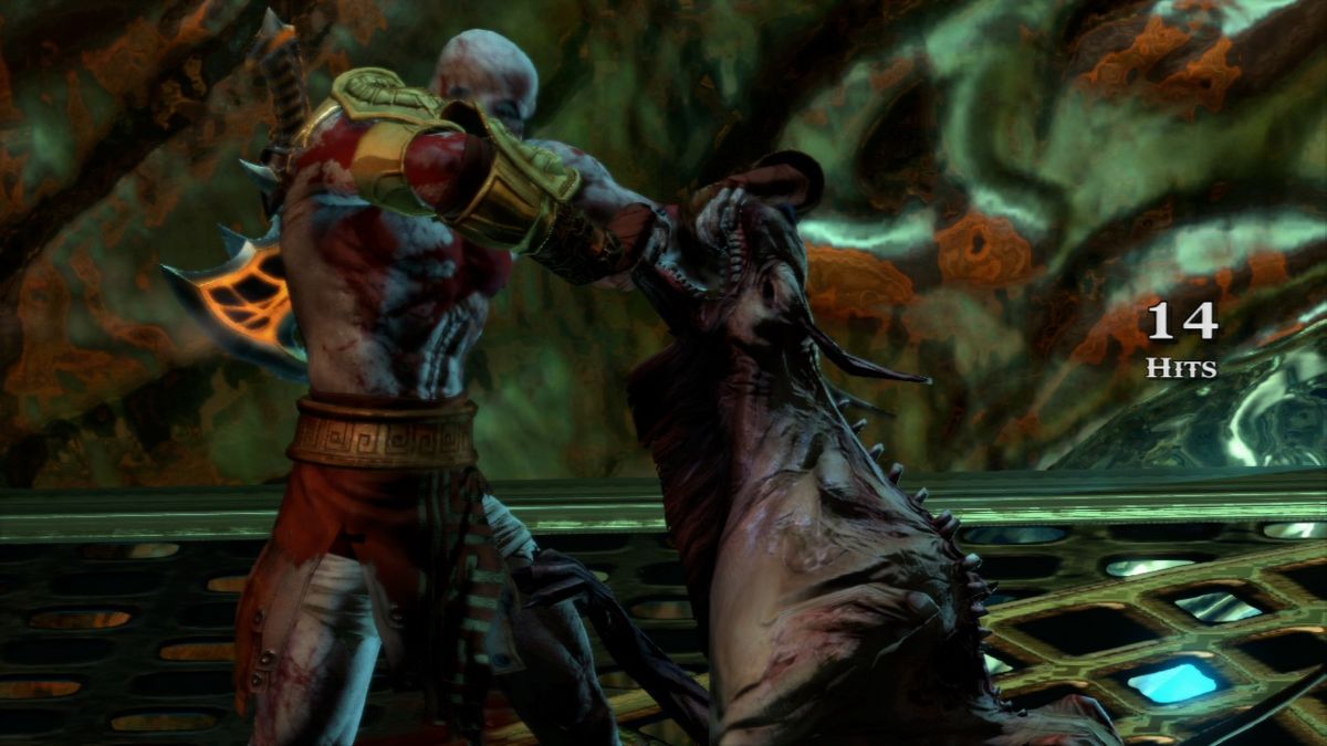 God of War III (PlayStation 3) screenshot: Hell hound is trying to chew more than it can handle.