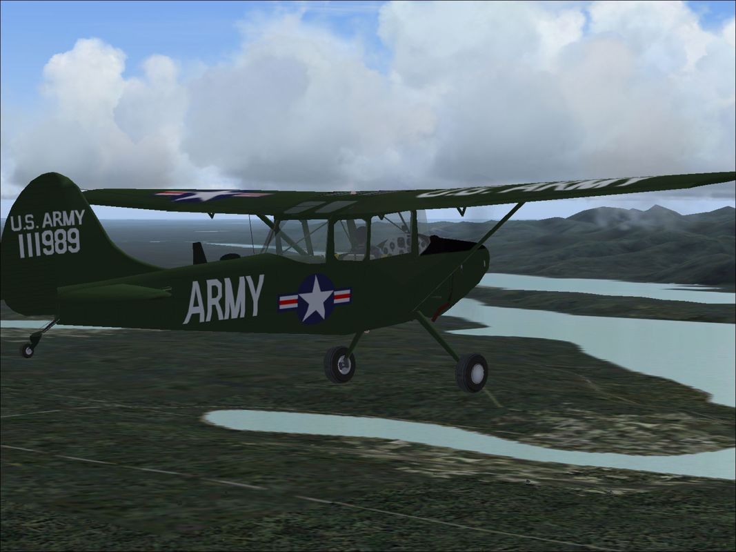 Combat Collectors: Second Edition (Windows) screenshot: The U S Army Cessna L-19 Bird Dog in flight.