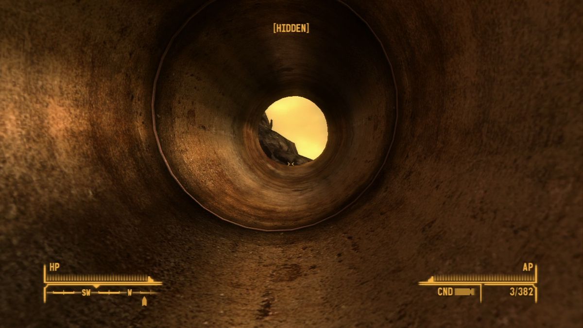 Fallout: New Vegas - Lonesome Road (PlayStation 3) screenshot: Walking through a large pipe without knowing what's on the other side.