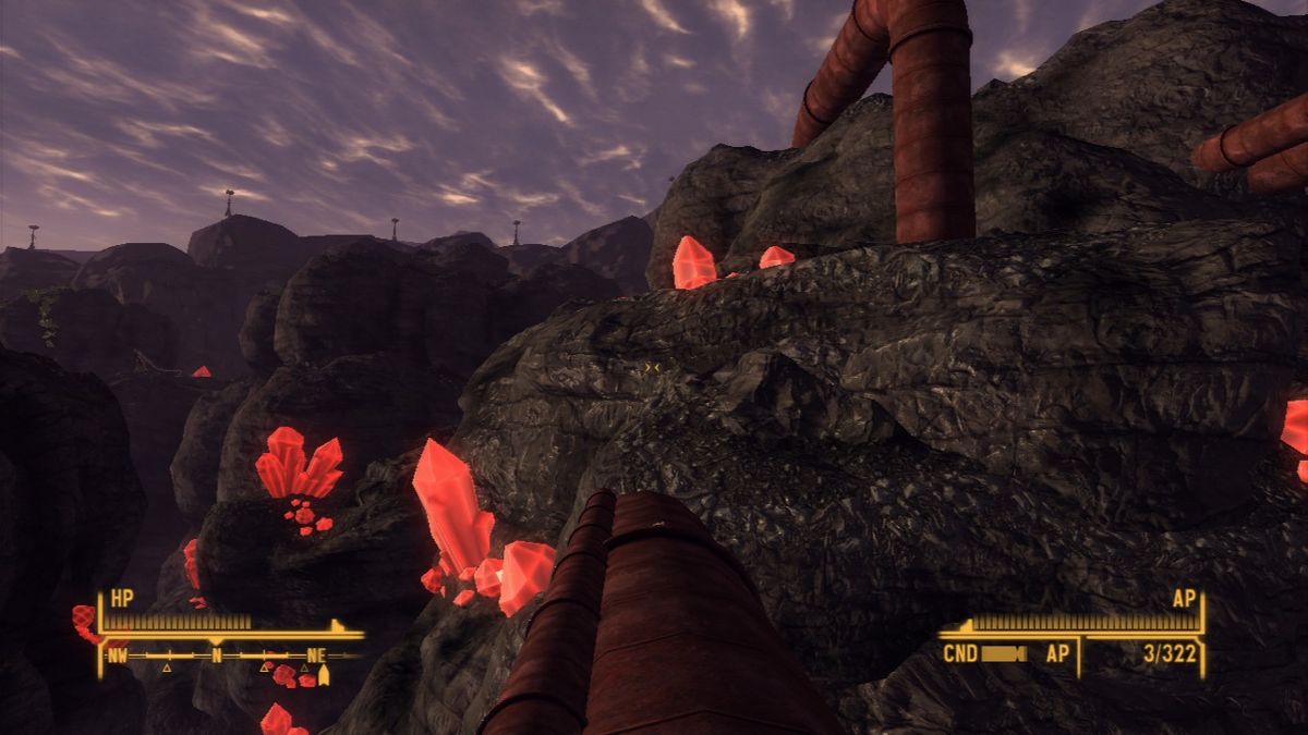 Fallout: New Vegas - Old World Blues (PlayStation 3) screenshot: Strange red crystals are all over the canyon below.