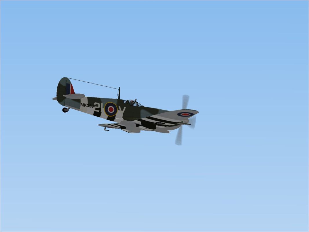 Battle of Britain: Memorial Flight (Windows) screenshot: The Spitfire Mk LFIKe MK356 in flight. All the spitfires have virtual cockpit views Microsoft Flight Simulator 2000 was used for this screen shot.