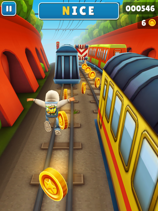 Subway Surfers (iPad) screenshot: Whee! Jumping over coins