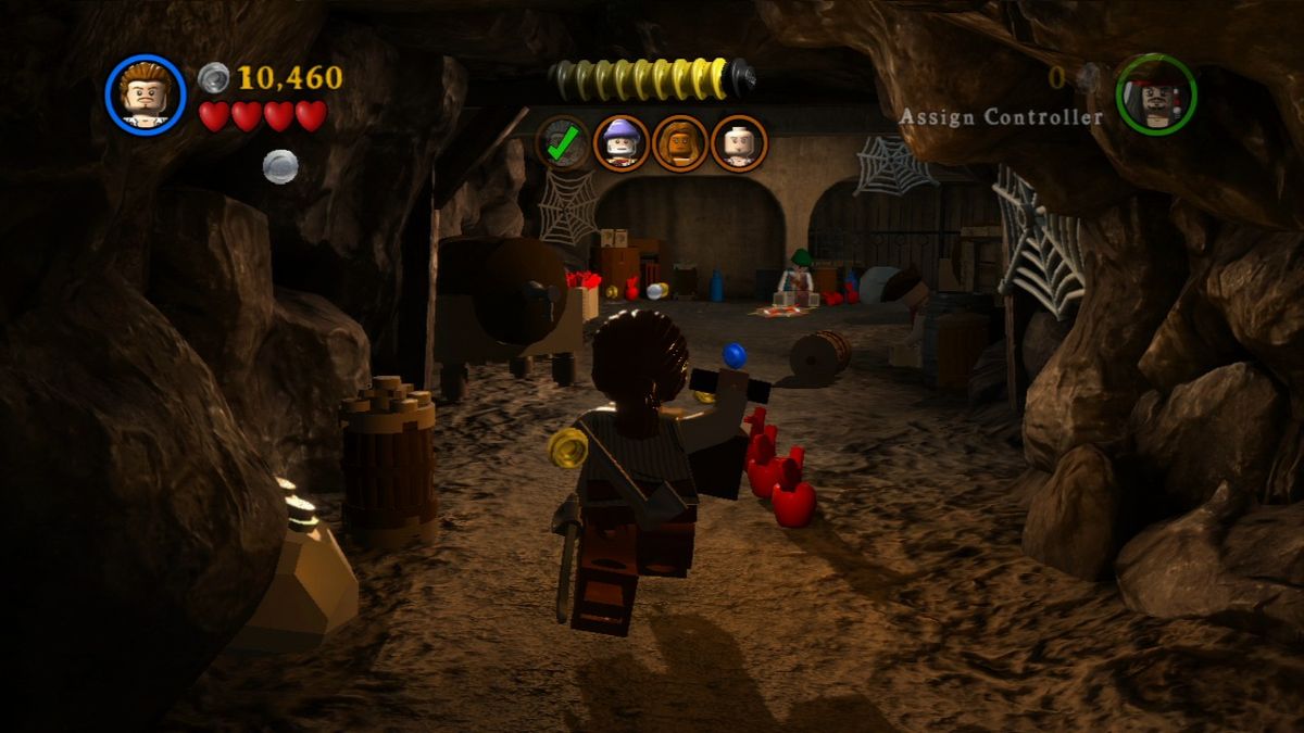 LEGO Pirates of the Caribbean: The Video Game (PlayStation 3) screenshot: Use the lantern to light your path in the cavern.