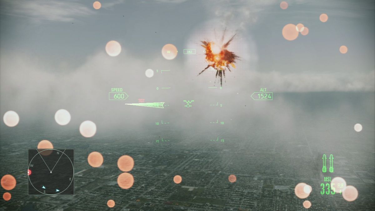 Ace Combat: Assault Horizon (PlayStation 3) screenshot: Flying in 1st-person perspective... enemy fighter shot down.