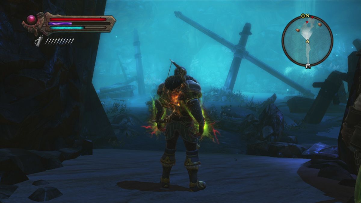 Kingdoms of Amalur: Reckoning (Xbox 360) screenshot: Inside a cave with a crashed boat