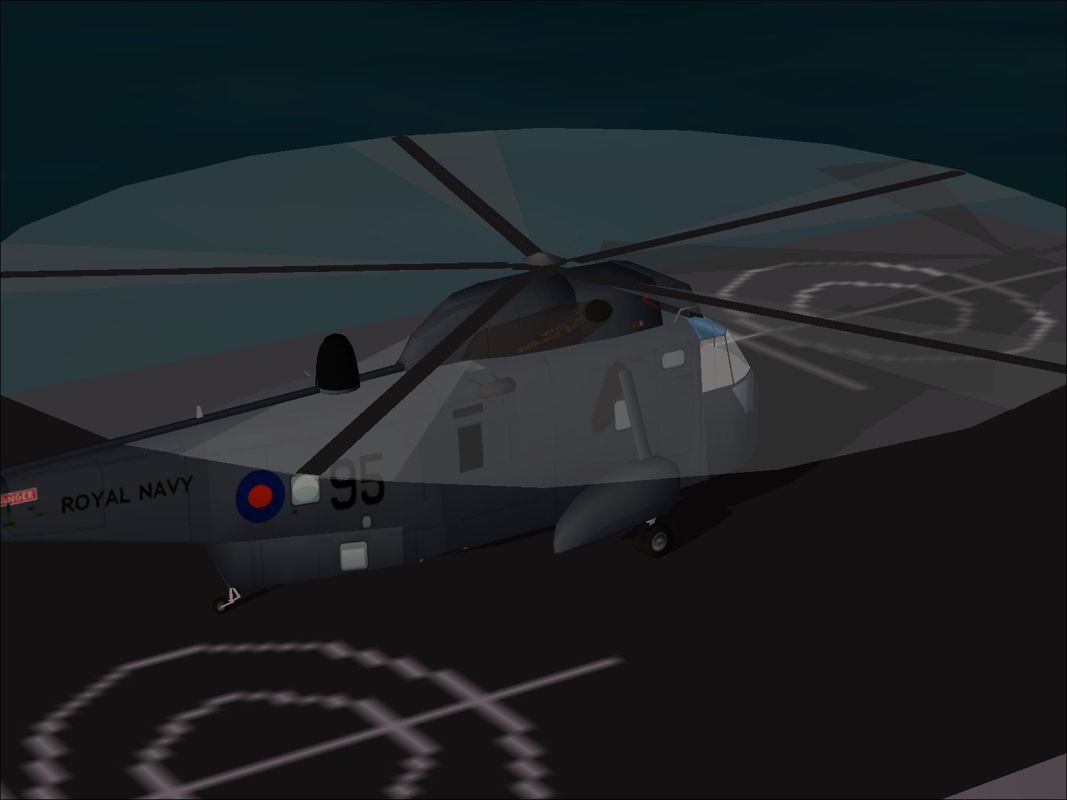 Harrier Jump Jet (Windows) screenshot: A Sea King helicopter taking off from HMS Fearless.
