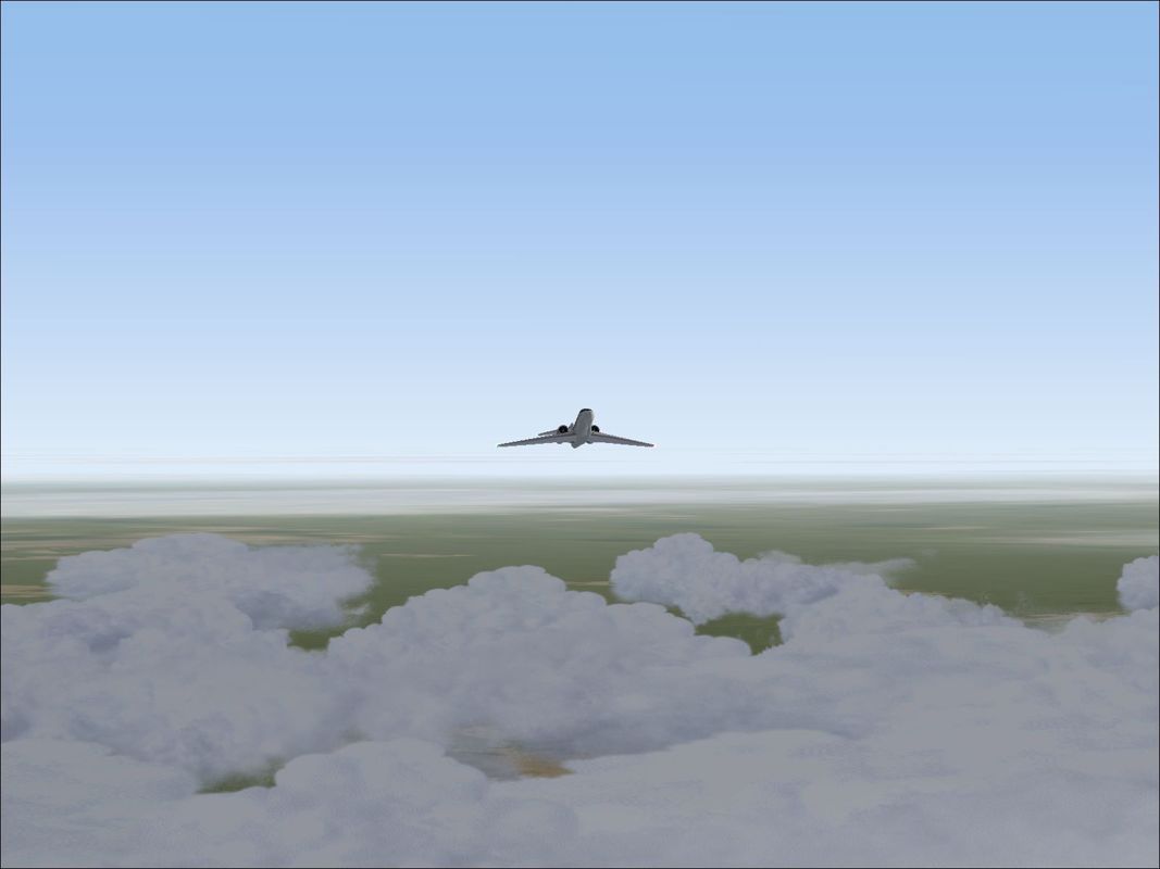 FS Clouds 2000 (Windows) screenshot: Later in the custom flight using the default simulator clouds, compare with the next screen shot which shows the same flight being flown using FSClouds.