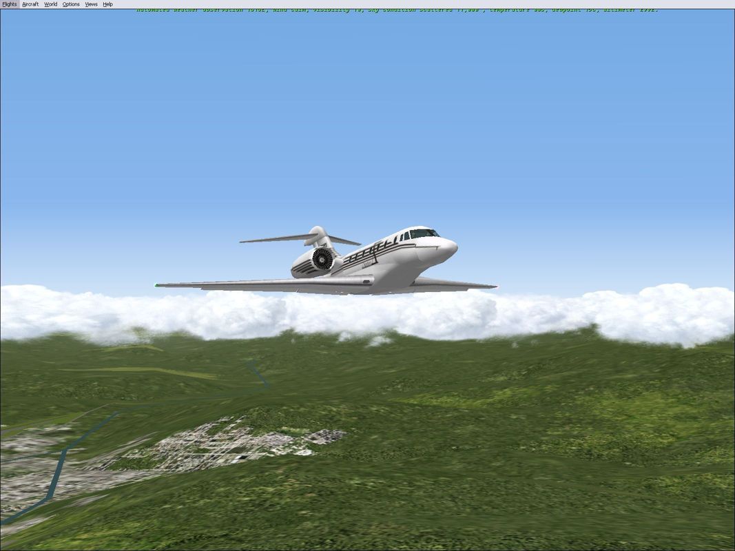 FS Clouds 2000 (Windows) screenshot: Flying out of Aspen using the flight simulator's clouds, compare with the previous screen shot that uses FSClouds