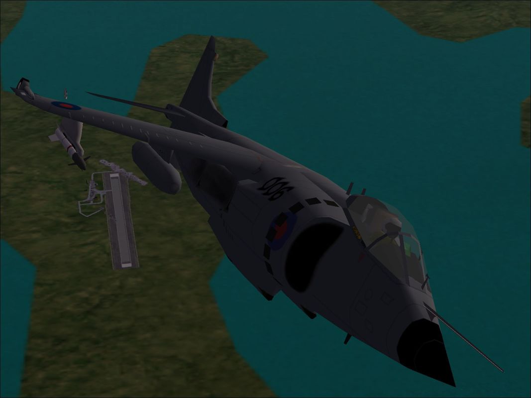Harrier Jump Jet (Windows) screenshot: The Royal Navy Sea Harrier FRS.1 loaded for air defence flying over Port Stanley. Being so far south the sun can stay quite low in the sky which affects light levels.