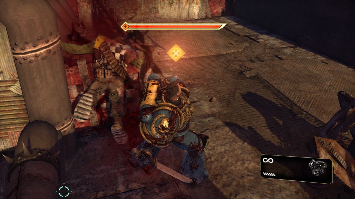 Warhammer 40,000: Space Marine (Windows) screenshot: Killing orcs is a bloody job!