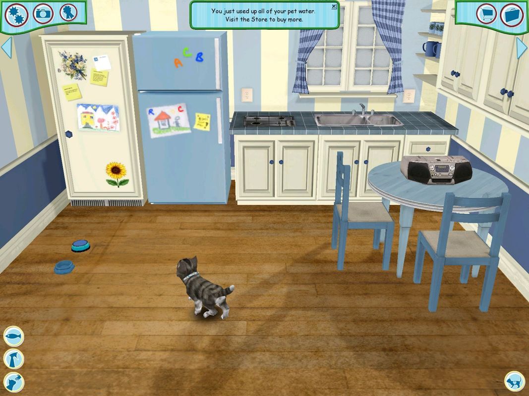 Catz (Windows) screenshot: This is the kitchen where Mobycat gets fed. The in-game boombox on the table is used to change the music.