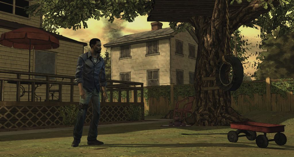 The Walking Dead (Windows) screenshot: Episode 1 - Lee explores the garden, looking for a safe place.