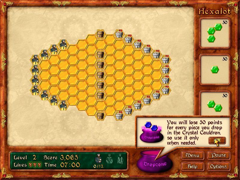 Hexalot (Windows) screenshot: If the crystal selected from the window on the right of the screen does not fit it can be disposed of in the cauldron but this incurs a penalty