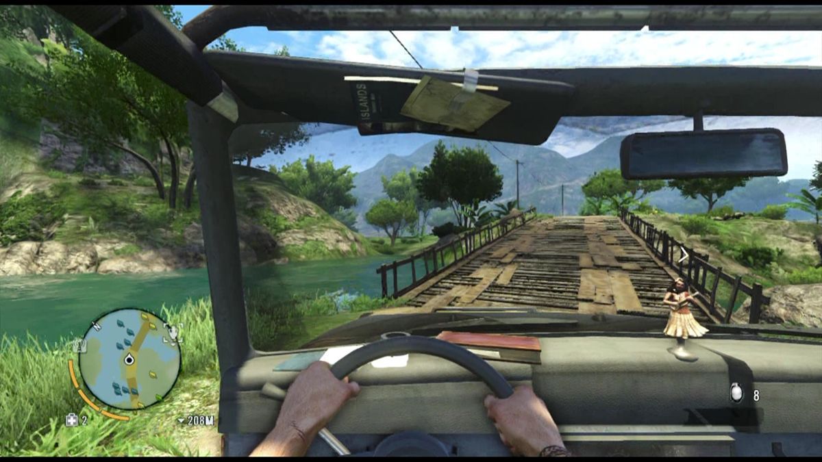 Far Cry 3 (Xbox 360) screenshot: Driving around in a jeep with a nice bobble head