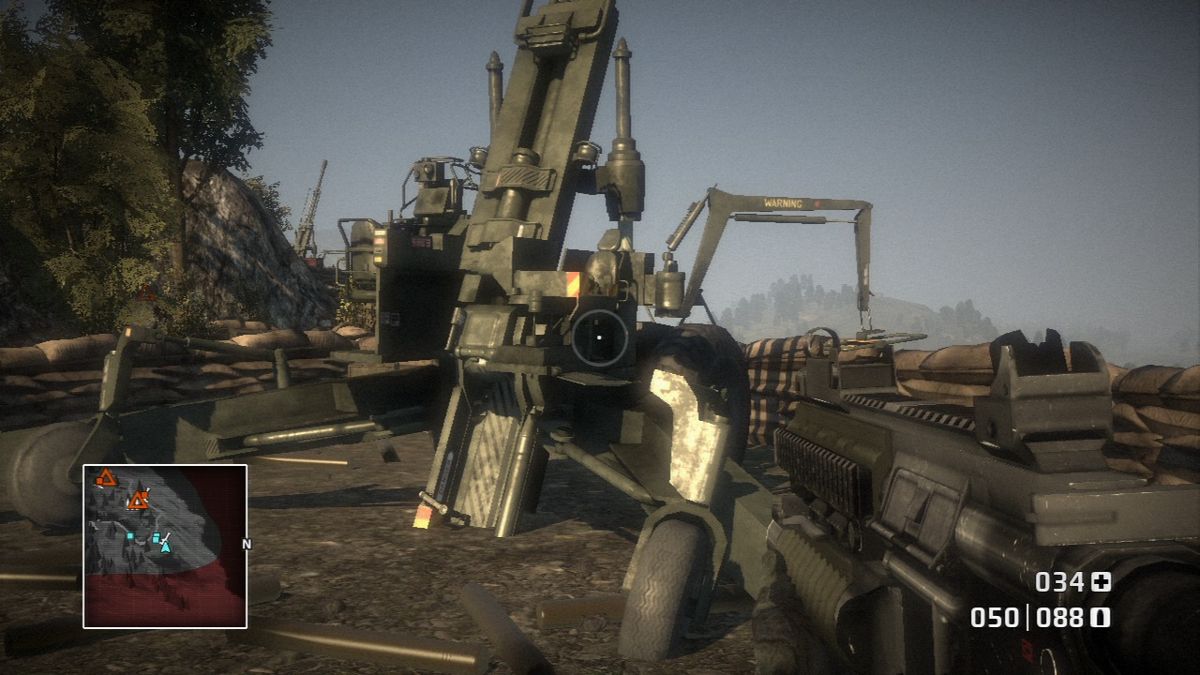 Battlefield: Bad Company (PlayStation 3) screenshot: Taking out enemy artillery squads.