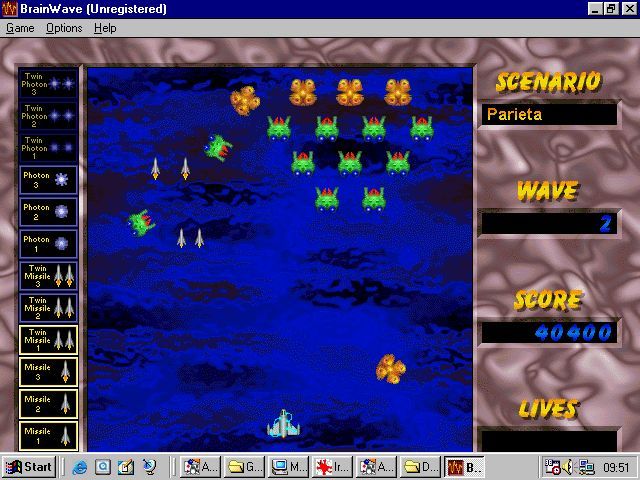 BrainWave (Windows 3.x) screenshot: The nanobots don't just march down the screen as in Space Invaders, they swoop and attack like they do in Galaxian. Note how the weapons have been upgraded by catching power-ups.