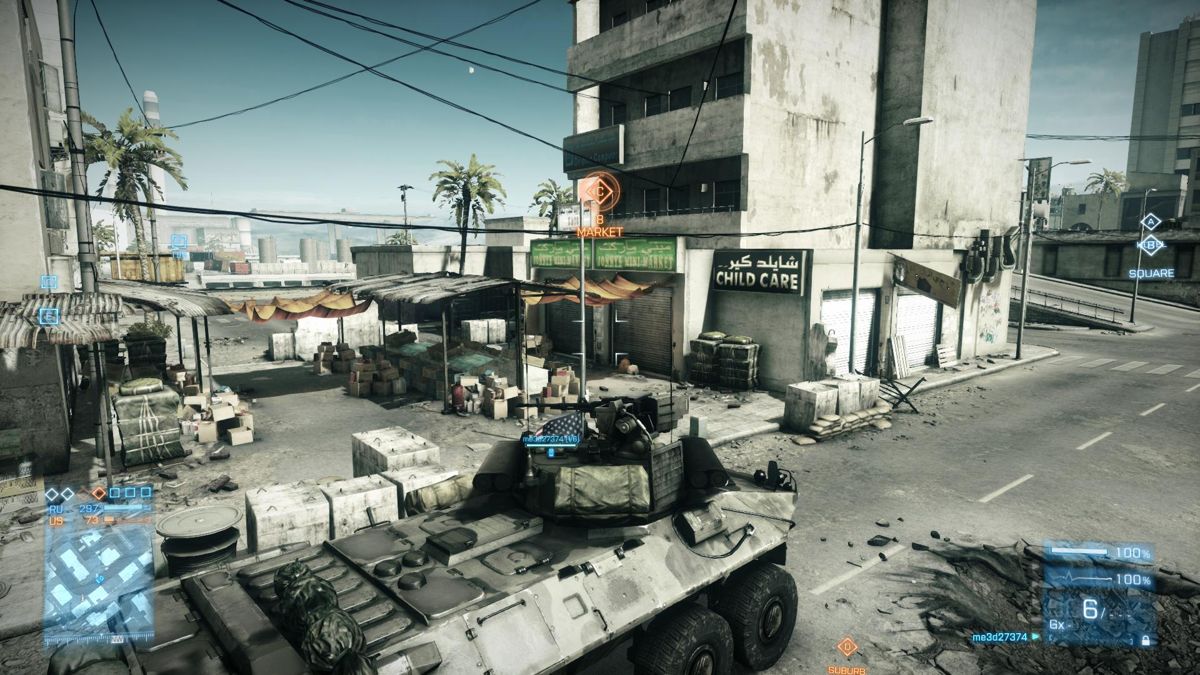 Battlefield 3: Back to Karkand (Windows) screenshot: Using the LAV-25 Infantery Fighting Vehicle to take the flag at Market