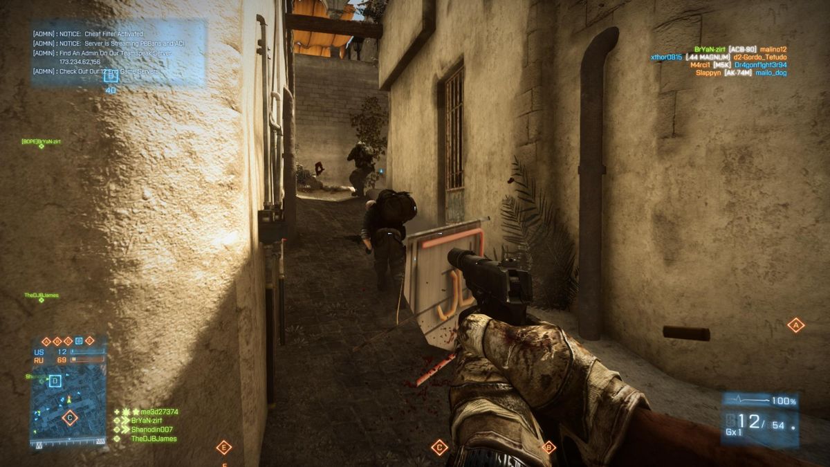 Battlefield 3: Aftermath (Windows) screenshot: Chasing two attackers down between close buildings for a knife kill if I can catch them to save ammo