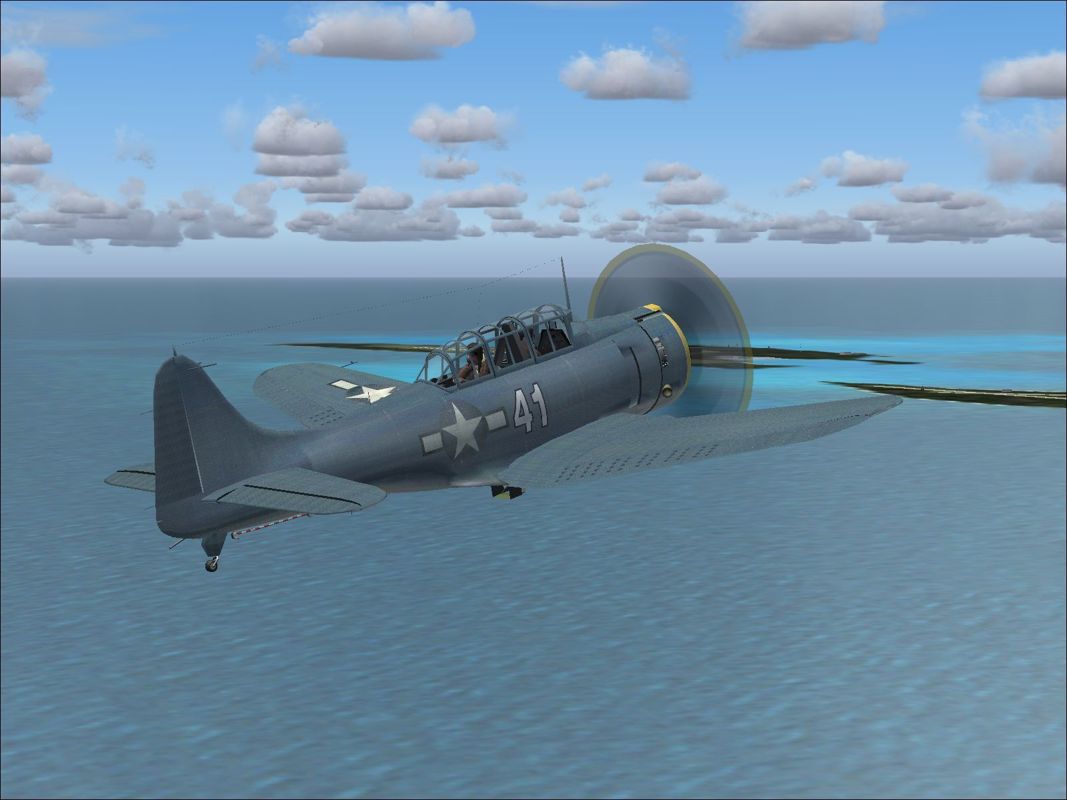 WWII Carrier Ops (Windows) screenshot: The Douglas SBD-3 Dauntless in flight