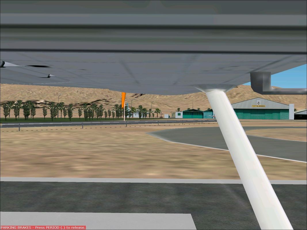 Scenery Spain 3: Canary Islands (Windows) screenshot: El Berriel is a small private airfield. This is the view from the window during take-off Flight Simulator 2002