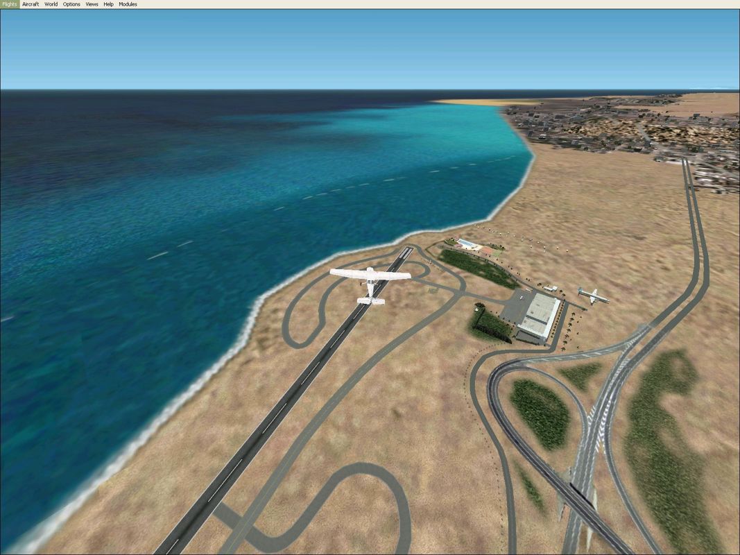 Scenery Spain 3: Canary Islands (Windows) screenshot: El Berriel from a distance and at altitude to show the extent of the airfield Flight Simulator 2002