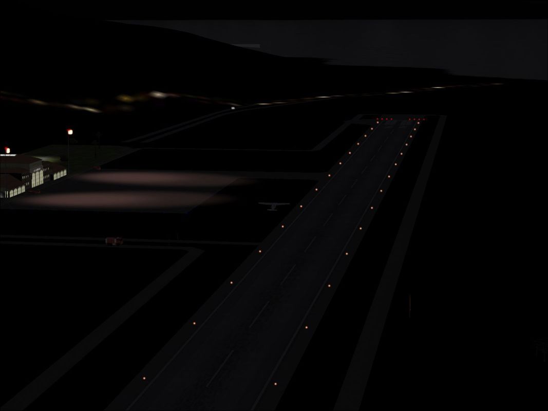 Scenery Spain 3: Canary Islands (Windows) screenshot: La Gomera airport buildings at night Flight Simulator 2004