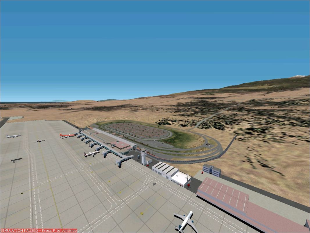 Scenery Spain 3: Canary Islands (Windows) screenshot: Tenerife South / Reina Sofia from the air to show the size of the airport Flight Simulator 2002