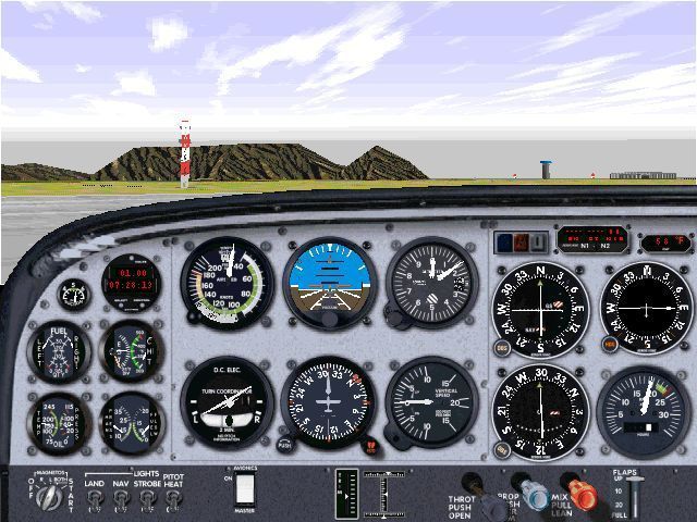 African Safari (Windows) screenshot: This is the cockpit view of Capetown airport using the Data Becker scenery and looking towards the hills through a little light cloud. Flight Simulator 98