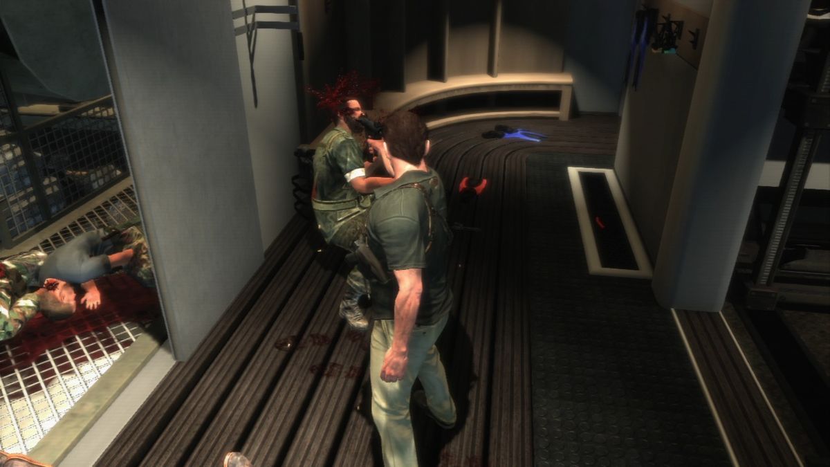 Max Payne 3 (PlayStation 3) screenshot: Head shot is easiest at close range after close combat.