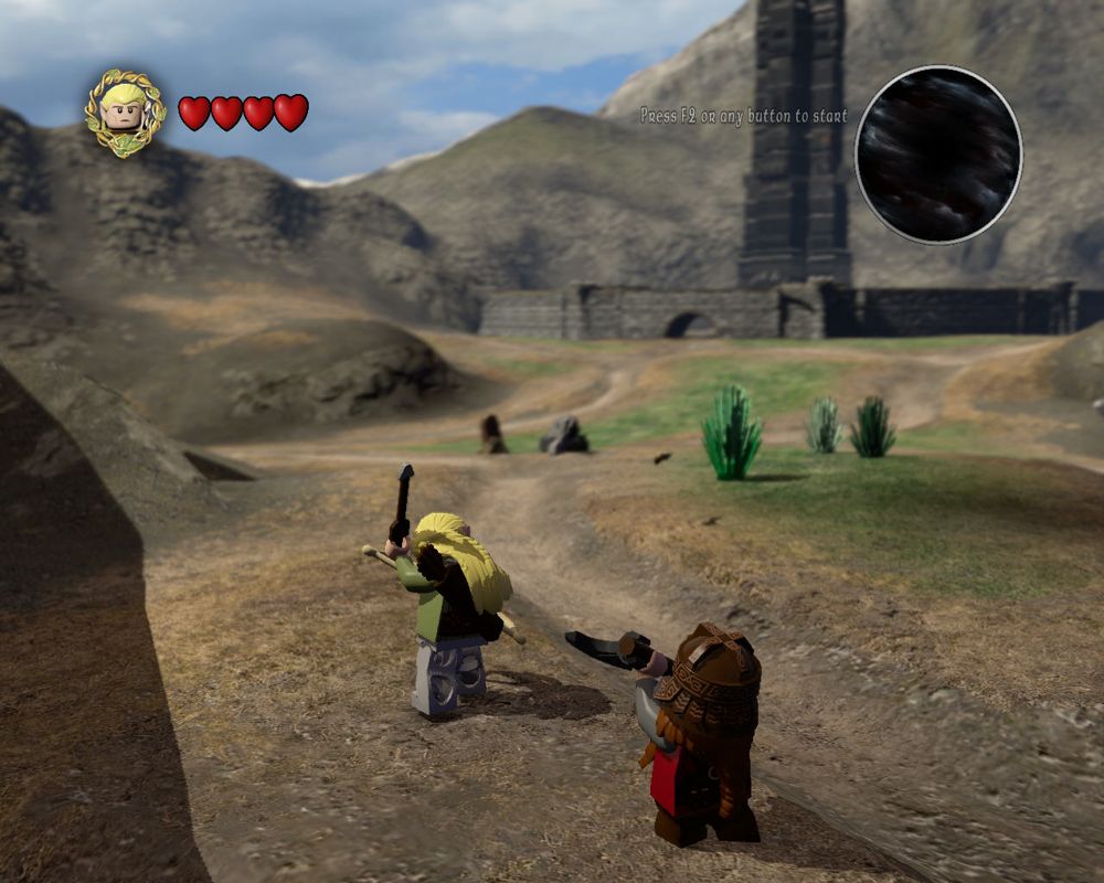 LEGO The Lord of the Rings (Windows) screenshot: Taking a break from the story and just exploring Middle Earth. Legolas and Gimli decide to go to Isengard, destroying some bushes on the way for money