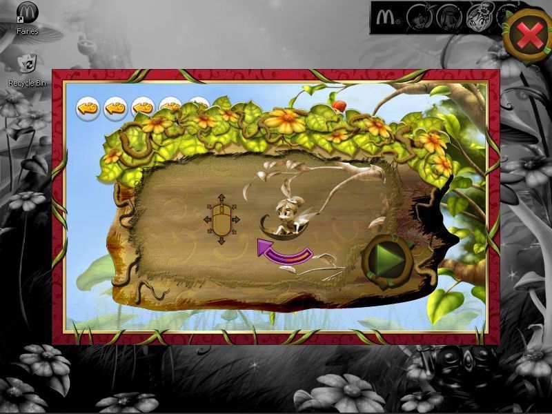 McDonald's Fairies and Dragons: Sunflower (Windows) screenshot: The instructions are shown in pictures so they suit all languages. Sunflower moves up, down and side to side depending on the way the player moves the mouse.