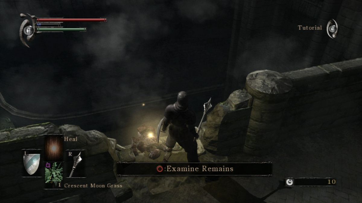 Demon's Souls (PlayStation 3) screenshot: Fallen comrades and enemies may leave useful items and weapons, so don't forget to search their remains whenever you see a glowing orb.