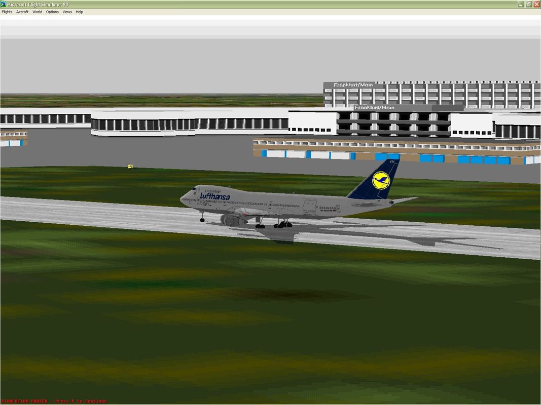 747 (Windows) screenshot: A Lufthansa Boeing 747 taking off at Frankfurt's main airport Microsoft Flight Simulator 98