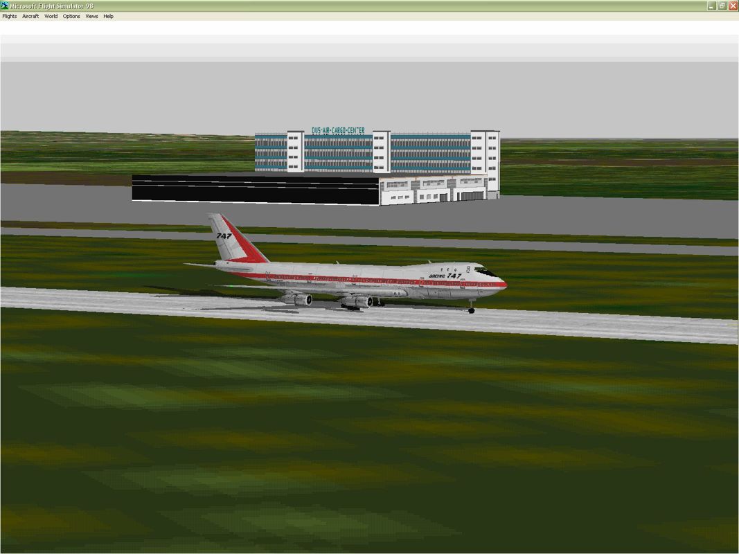 747 (Windows) screenshot: The Boeing 747-100 in original factory livery taking off from Dusseldorf airport using the new airplane and the new airport Microsoft Flight Simulator 98