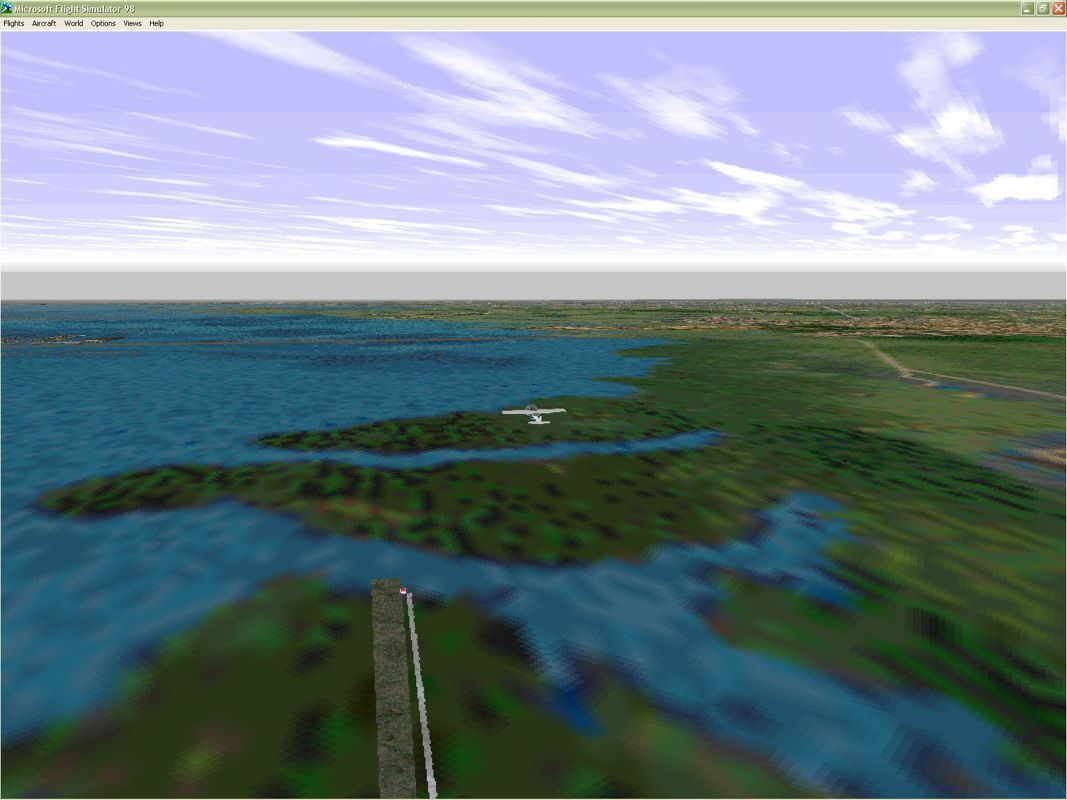 Venezia 98 (Windows) screenshot: Shortly after take-off from Venice's Tessera airport and heading out over the lagoon using the new scenery. Venice is over on the left. Microsoft Flight Simulator 98