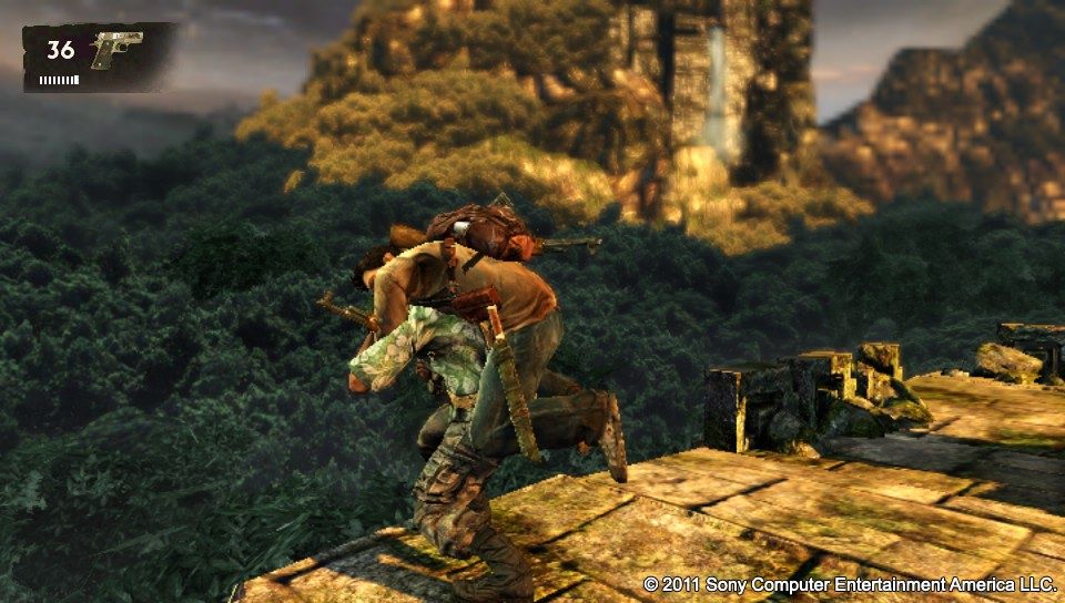 Uncharted: Golden Abyss (PS Vita) screenshot: If you approach the enemy from behind, close combat button will yield a stealth kill.