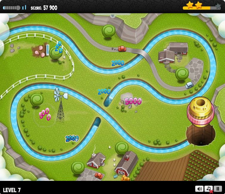 Hoop De Loop Saga (Browser) screenshot: Different colored jewels are worth different points.