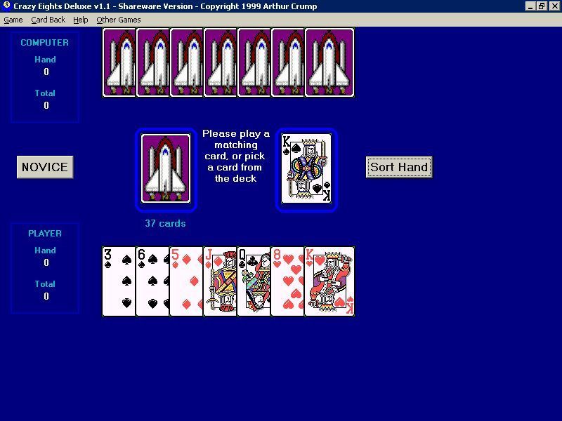 Crazy Eights Deluxe (Windows 3.x) screenshot: This is the game area and card layout. It's turn based and instructions are shown in the centre of the screen.