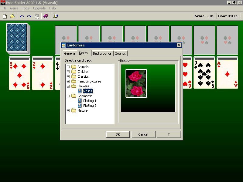Free Spider (Windows) screenshot: The card back and background can be altered via the menu bar's customisation option