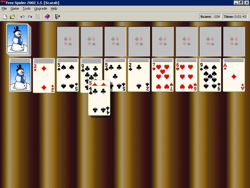 Free Spider (Windows) screenshot: A game of Scarab in progress. Cards are dragged and dropped into position