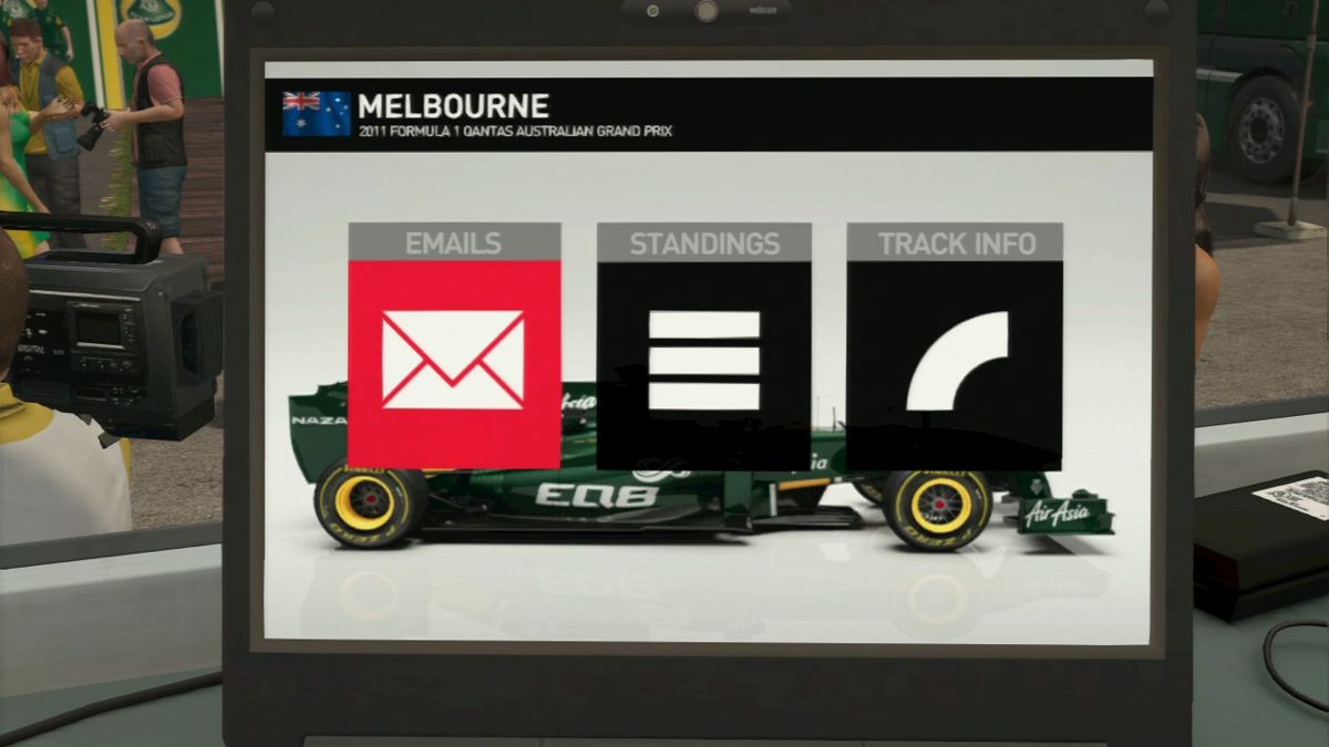 F1 2011 (PlayStation 3) screenshot: On laptop you can read your emails, check current standings or get familiar with the track.