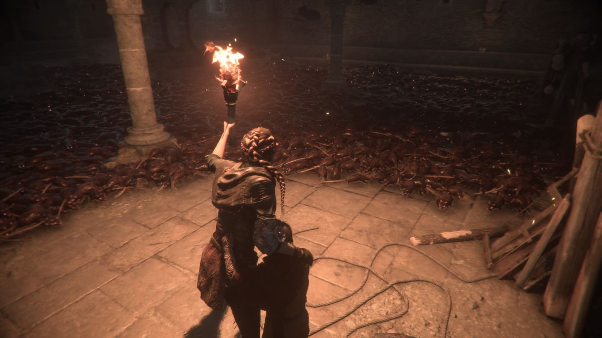 A Plague Tale: Innocence (PlayStation 4) screenshot: The rats are pouring from every hole, luckily, they're afraid of fire