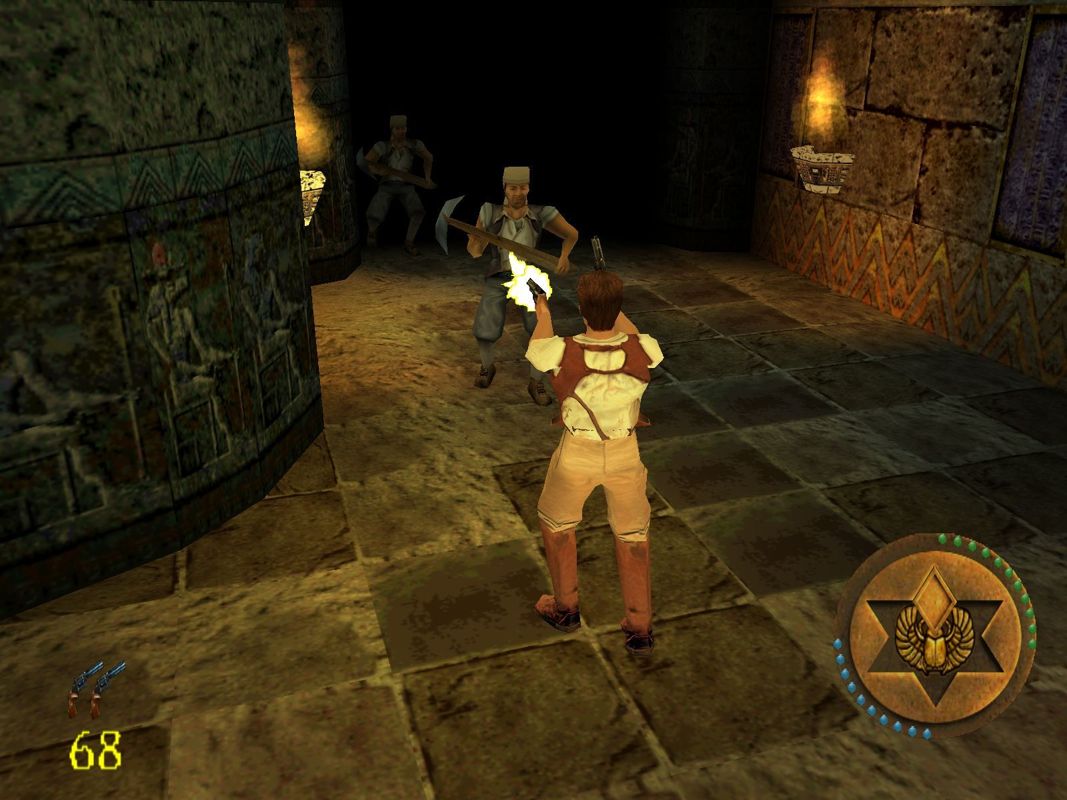 The Mummy (Windows) screenshot: In addition to the torch/club the player can use pistols, magic amulets, shotgun, dynamite and a Lewis gun