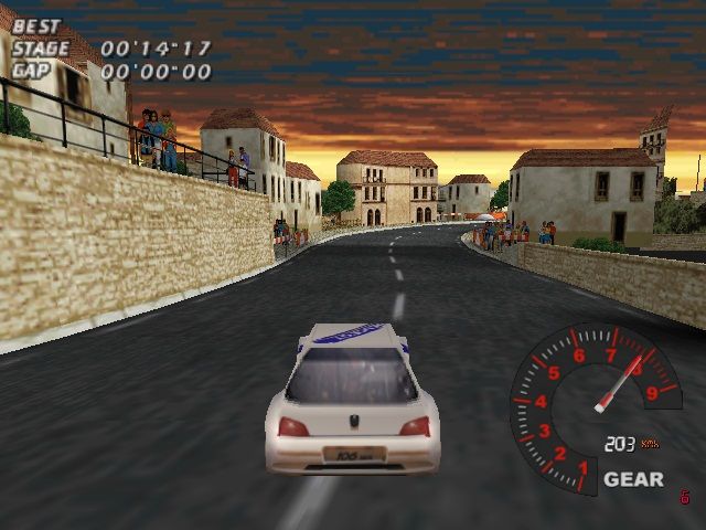 V-Rally: Edition 99 (Windows) screenshot: Village at the evening.