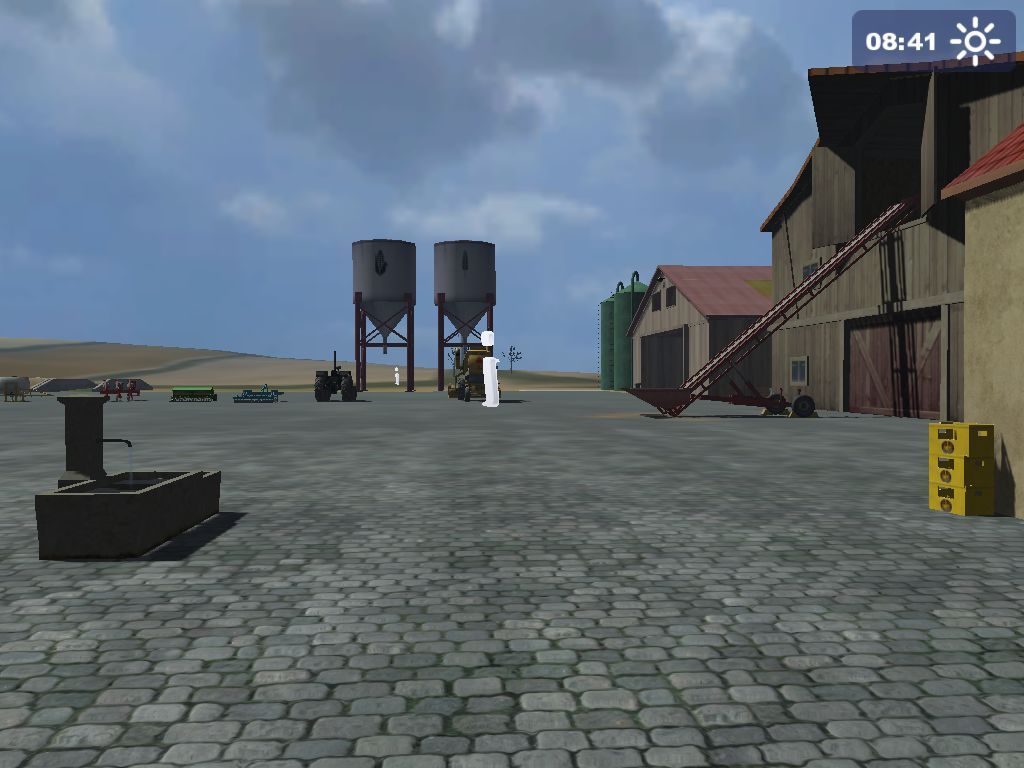 Farming Simulator 2009 (Windows) screenshot: This is the players first view of the farm. The white symbols are information points, beyond them is the farm's equipment.