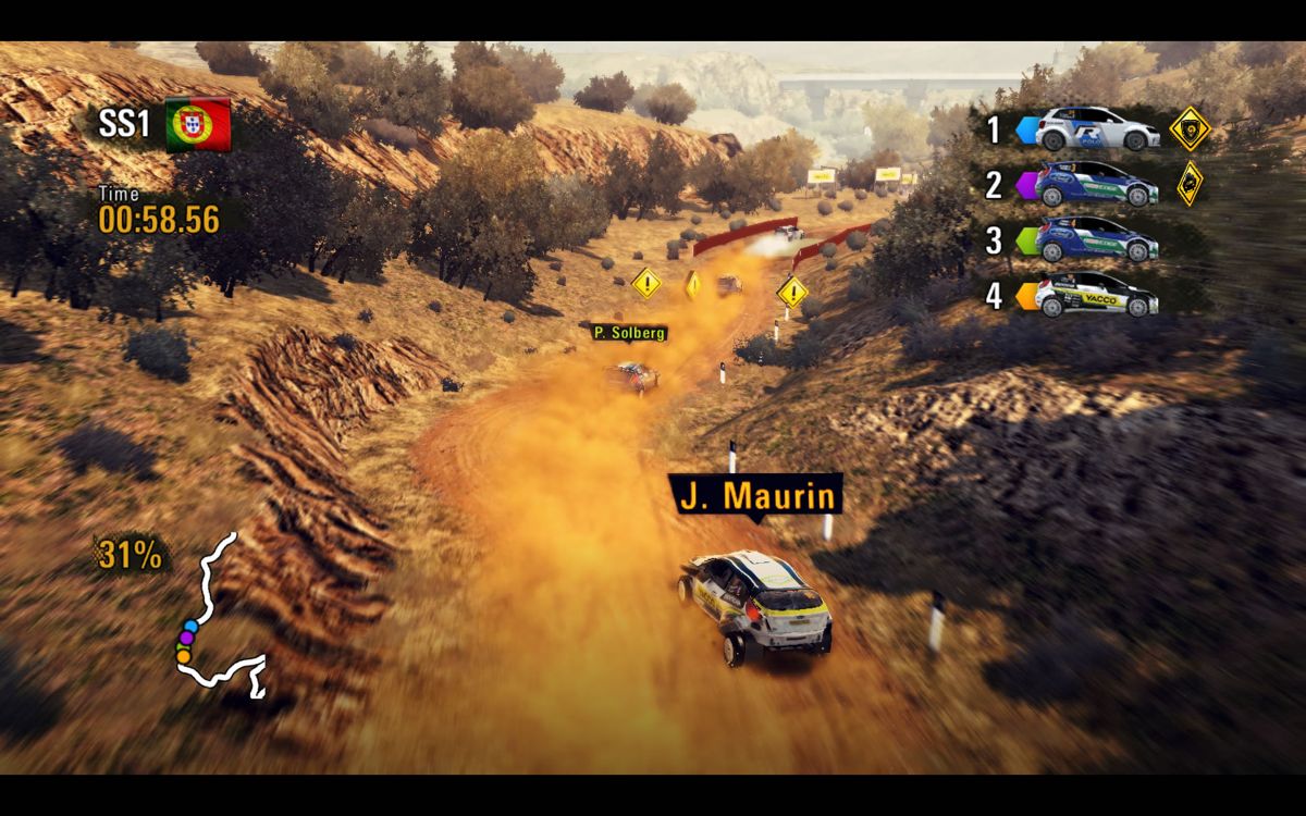 WRC Powerslide (Windows) screenshot: In pursuit on a dusty track in Portugal