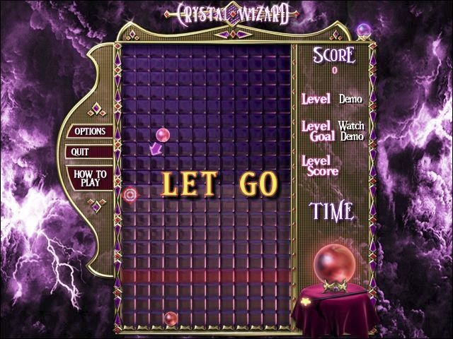 Crystal Wizard (Windows) screenshot: There's an in-game tutorial. This is part of the section that explains how to aim the gem by throwing it so that it bounces off the side wall using the mouse to Click, Drag-to-aim, and release